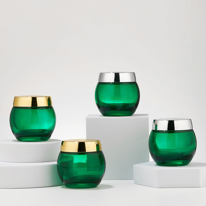 جرة مستحضرات التجميل الزجاجية الشفافة الخضراء جرة غسول الجسم الفارغة