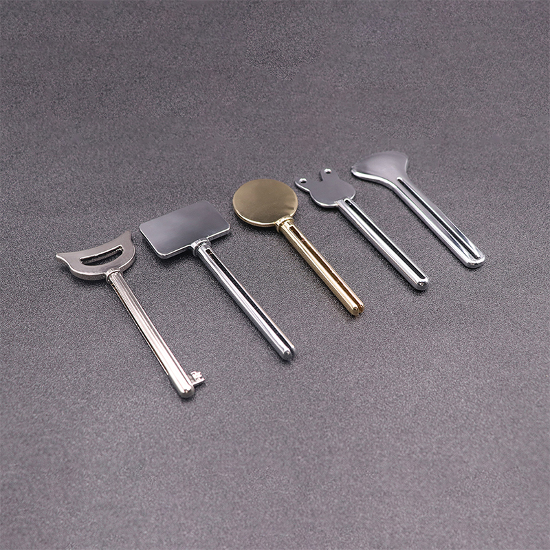 موزع معجون الأسنان المعدني، منظف الوجه، أنبوب معجون الأسنان، عصارة أنبوب مستحضرات التجميل على شكل مفتاح موزع معجون الأسنان المعدني، منظف الوجه، أنبوب معجون الأسنان، عصارة أنبوب مستحضرات التجميل على شكل مفتاح