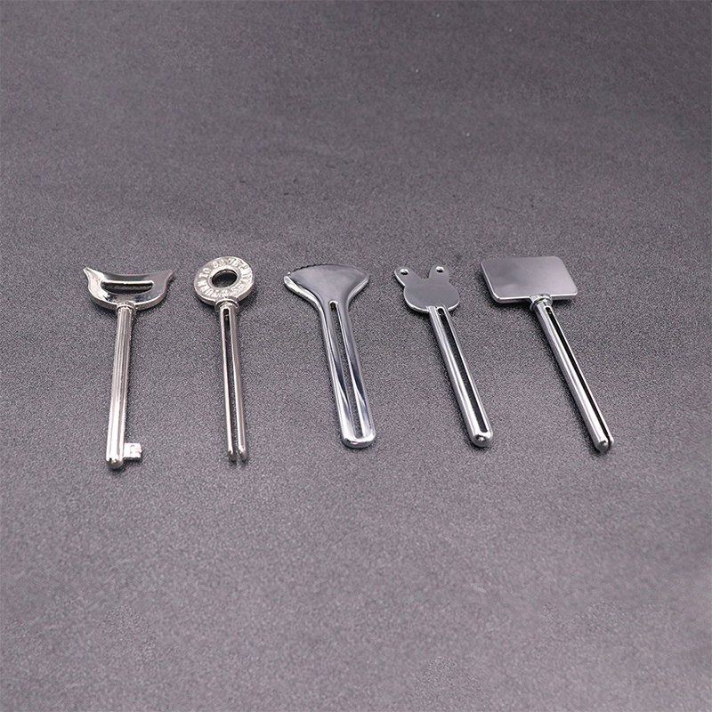 موزع معجون الأسنان المعدني، منظف الوجه، أنبوب معجون الأسنان، عصارة أنبوب مستحضرات التجميل على شكل مفتاح موزع معجون الأسنان المعدني، منظف الوجه، أنبوب معجون الأسنان، عصارة أنبوب مستحضرات التجميل على شكل مفتاح