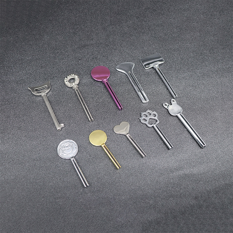 موزع معجون الأسنان المعدني، منظف الوجه، أنبوب معجون الأسنان، عصارة أنبوب مستحضرات التجميل على شكل مفتاح موزع معجون الأسنان المعدني، منظف الوجه، أنبوب معجون الأسنان، عصارة أنبوب مستحضرات التجميل على شكل مفتاح