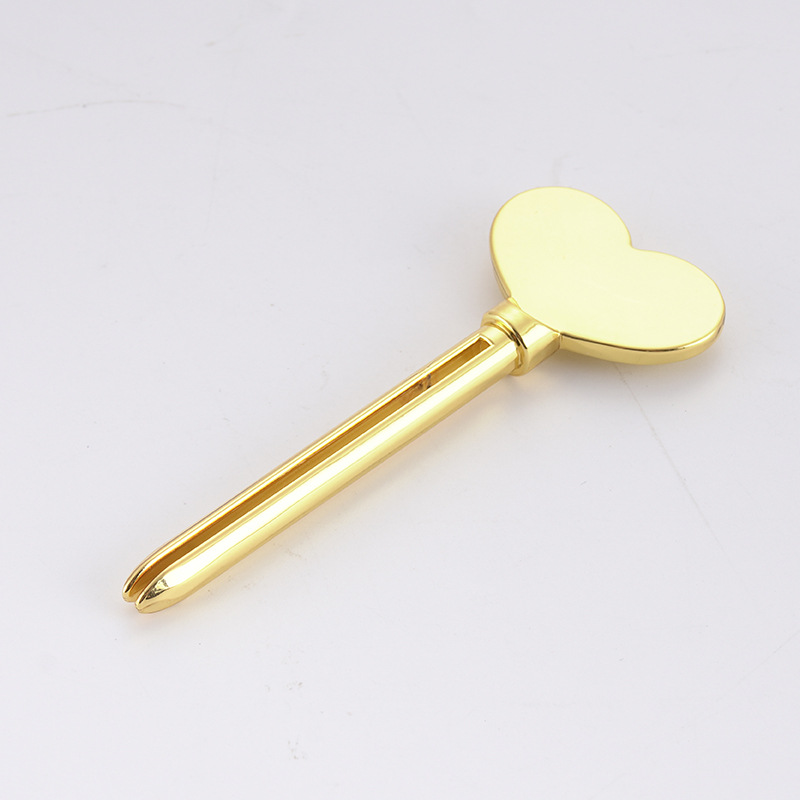 موزع معجون الأسنان المعدني، منظف الوجه، أنبوب معجون الأسنان، عصارة أنبوب مستحضرات التجميل على شكل مفتاح موزع معجون الأسنان المعدني، منظف الوجه، أنبوب معجون الأسنان، عصارة أنبوب مستحضرات التجميل على شكل مفتاح