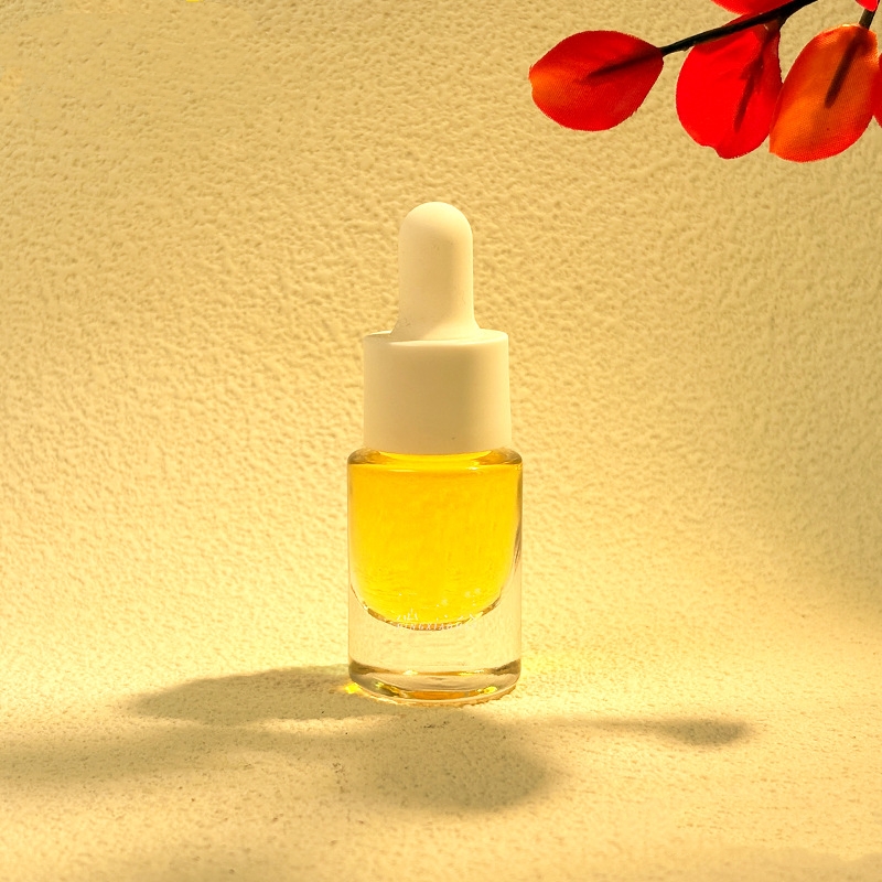 زجاجات الزيوت العطرية الزجاجية الصغيرة ذات القطارات المعدنية أو الخشبية