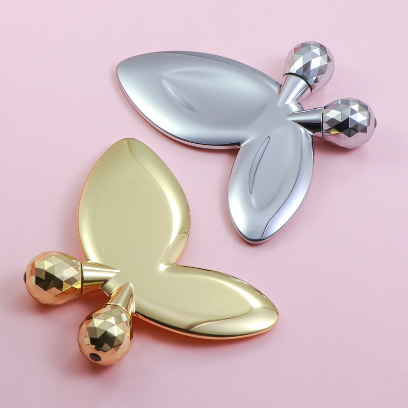 أسطوانة تدليك الوجه على شكل فراشة من سبائك الزنك