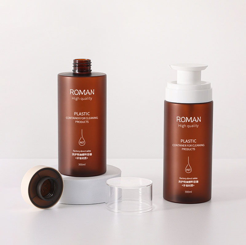 زجاجات بلاستيكية مع موزع مضخة مانعة للتسرب، أسطوانة كبيرة فارغة من العنبر الشفاف قابلة لإعادة الملء لزيوت الشامبو وبلسم الشعر