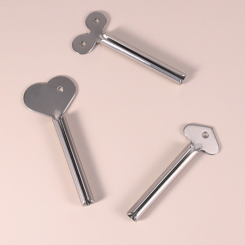 مفتاح أنبوب معجون الأسنان الدوار عصارة الفولاذ المقاوم للصدأ أنبوب دوار عصارة أنبوب معدني مفتاح عصارة