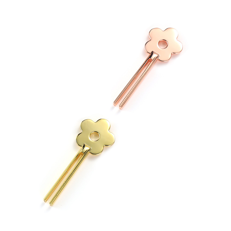 عصارة أنبوبية مصنوعة من سبائك الزنك على شكل زهرة مبتسمة عصارة أنبوبية مصنوعة من سبائك الزنك على شكل زهرة مبتسمة