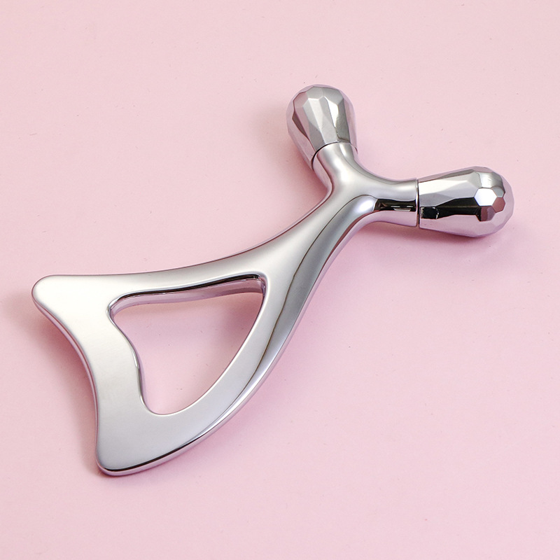 أسطوانة تدليك العين من سبائك الزنك وأداة غوا شا للوجه أسطوانة تدليك العين من سبائك الزنك وأداة غوا شا للوجه